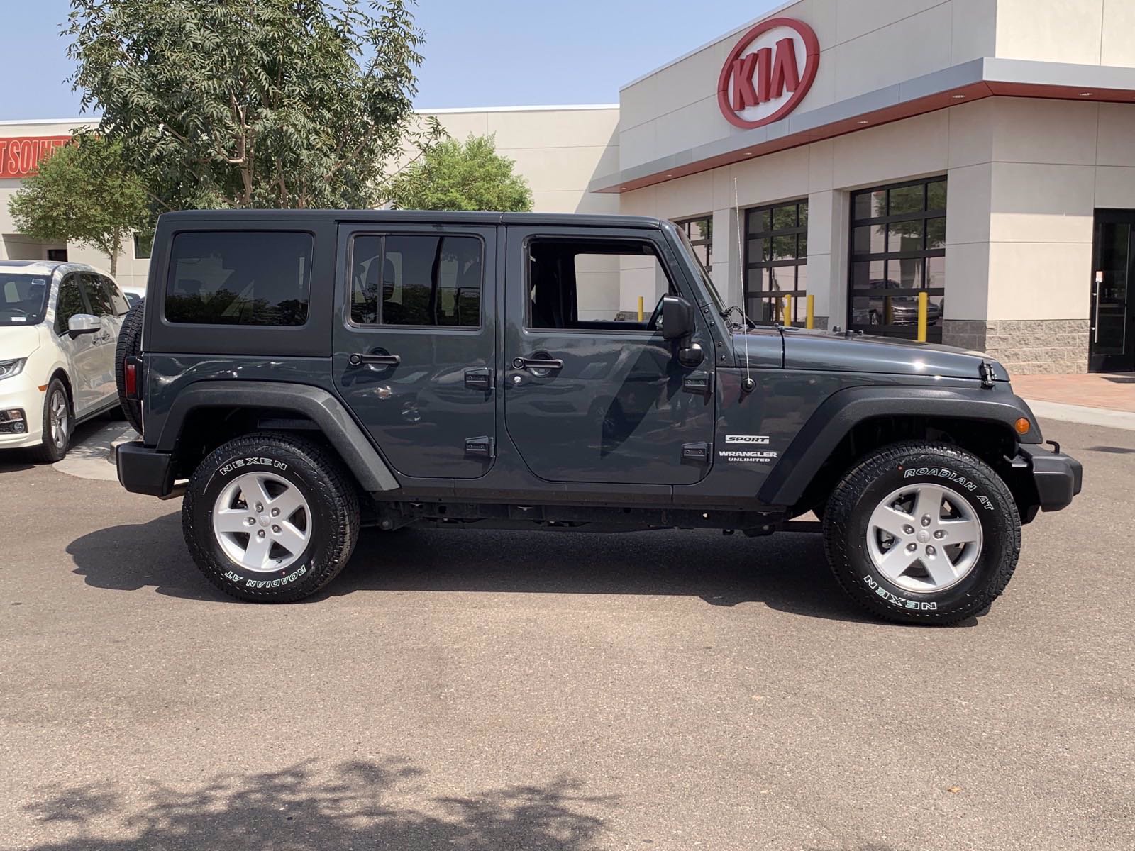 Pre-Owned 2017 Jeep Wrangler Unlimited Sport Convertible ...